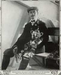 Dorando Pietri, the Queen's own prise winner in the marathon-race, with the cup he received from Her Majesty. From the Illustrated London News Supplement